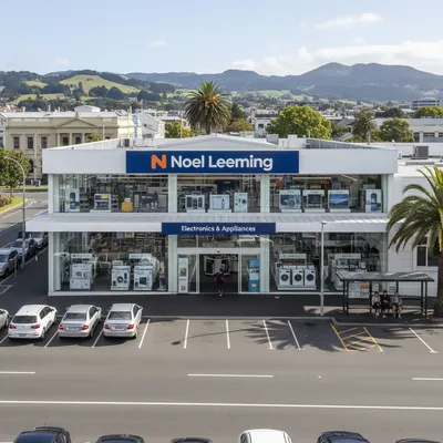 The storefront of the Noel Leeming electronics store on Crawford Street in Dunedin, with its clear branding, glass entrance, and a view of the street outside.